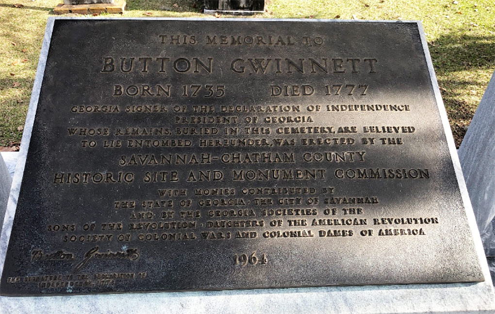 A marker placed at the gravesite of Button Gwinnett in 1964